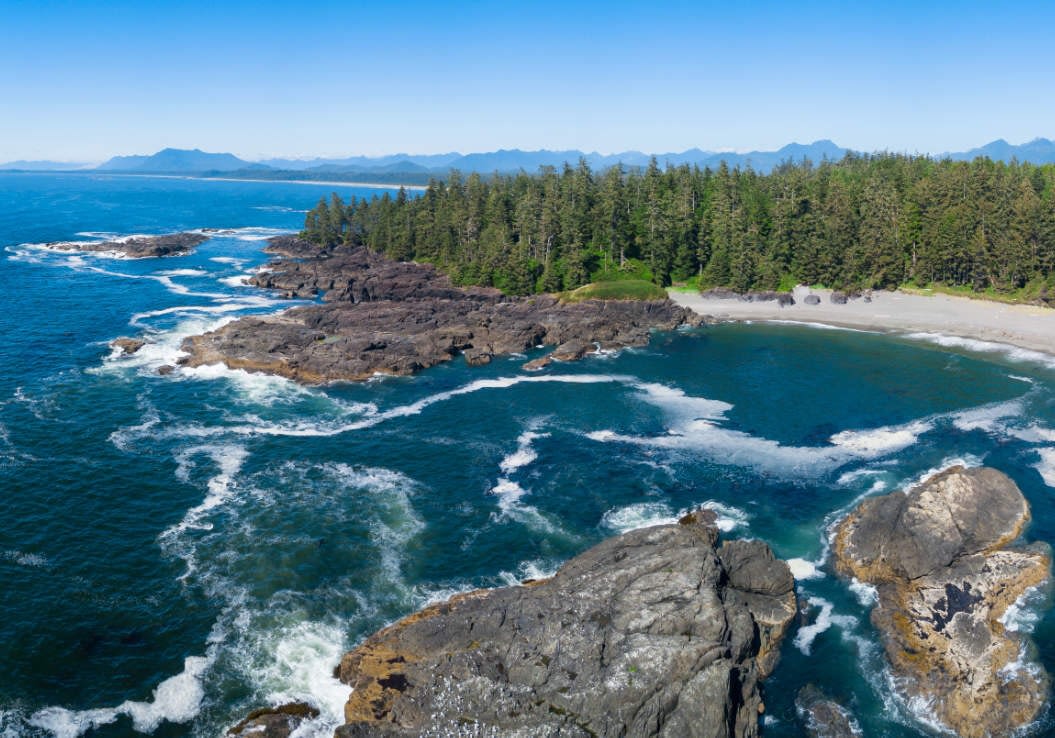 Beautiful rocky beach landscape at Pacific Ocean Coast. Picture taken South of Wickaninnish Beach near Tofino and Ucluelet on Vancouver Island, British Columbia, Canada.